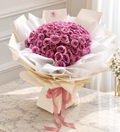 Bouquet of 99 premium lilac roses from FlowerPlus花加, showcasing delicate, lush lilac-colored roses arranged beautifully.