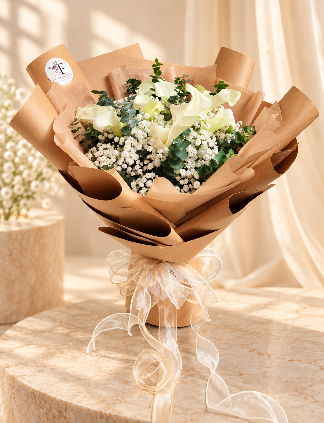 FlowerPlus White Calla Lilies Bouquet arranged elegantly on a marble surface