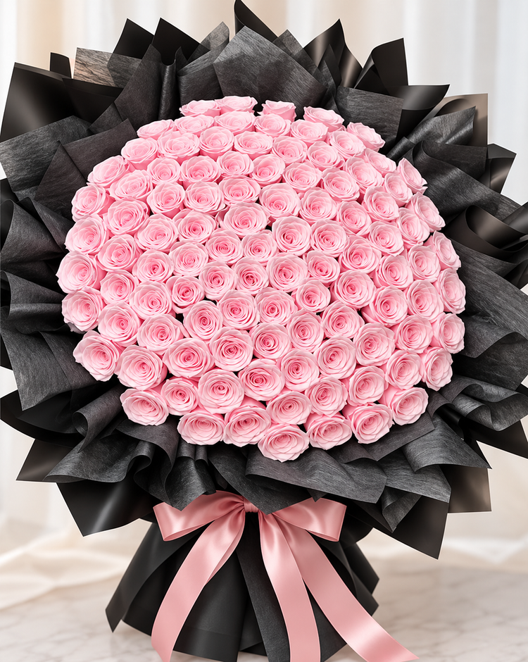 Light pink preserved roses bouquet from FlowerPlus花加 with black wrapping, perfect for Valentine's Day celebrations.