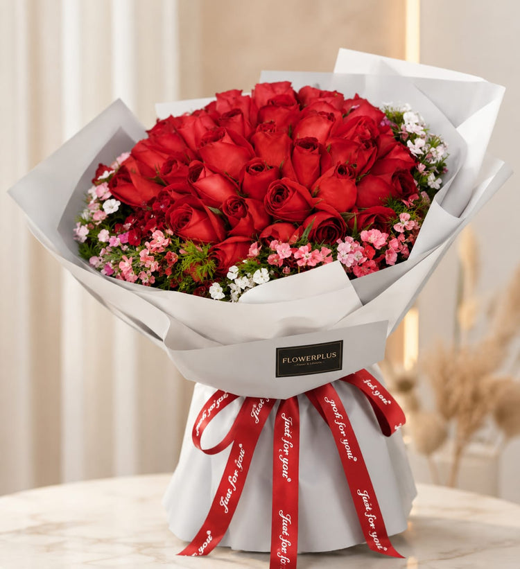 Bouquet of 99 red roses with sweet Williams flowers from FlowerPlus花加, arranged in a lush, vibrant floral display.