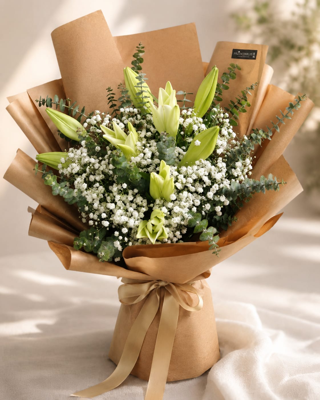 White single lily bouquet from FlowerPlus花加 featuring fresh, elegant lilies arranged in a simple, charming floral display.